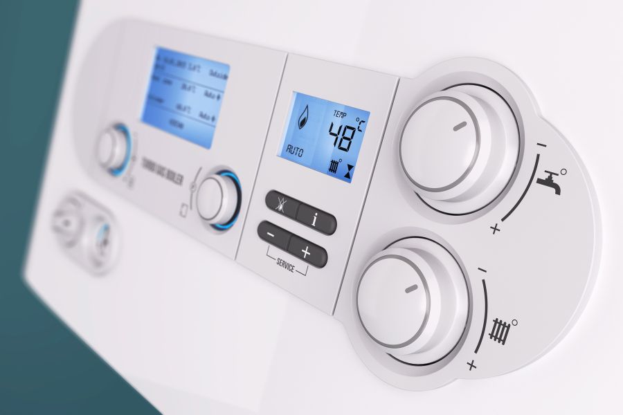 A combi boiler control panel with settings for boiler flow temperature