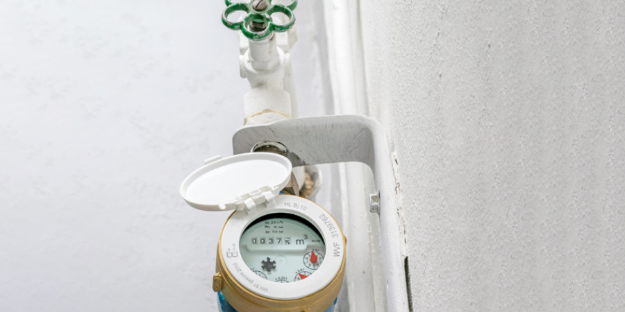 A modern water meter and stop-cock, with a key to turn it off